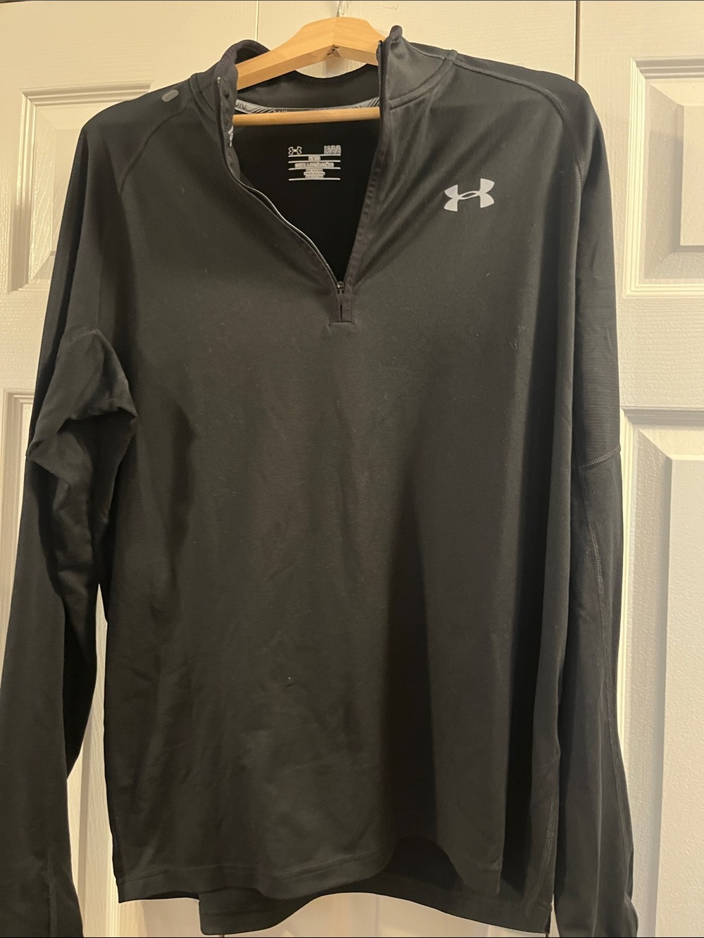 Under Armour Black Long Sleeve 1/4 Zip Performance Run. Like new..